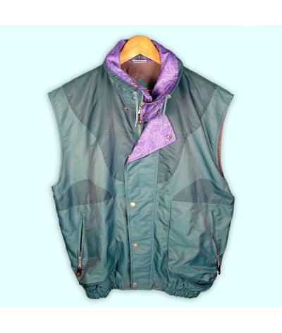 Veste sans manche de la marque Equipe verte et violette, motif à l'intérieur. Deux poches à fermeture sur les côtés.