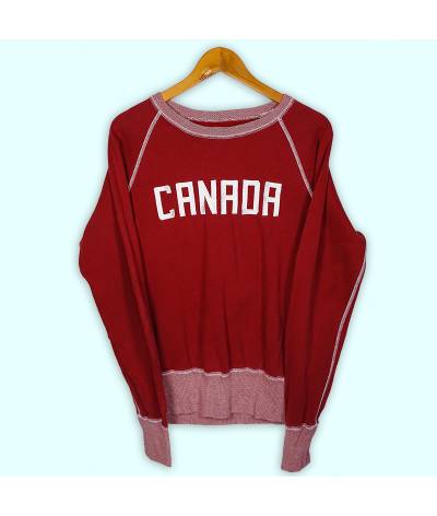 Sweat Canada bordeaux, grand logo brodé à l'avant. Elastiques larges aux manches et à la taille.
