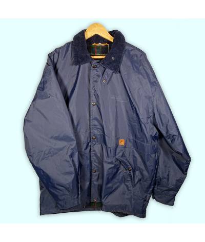 Manteau K-WAY bleu marine foncé. Doublure épaisse style tartan. Poche intérieure et deux poches extérieures.